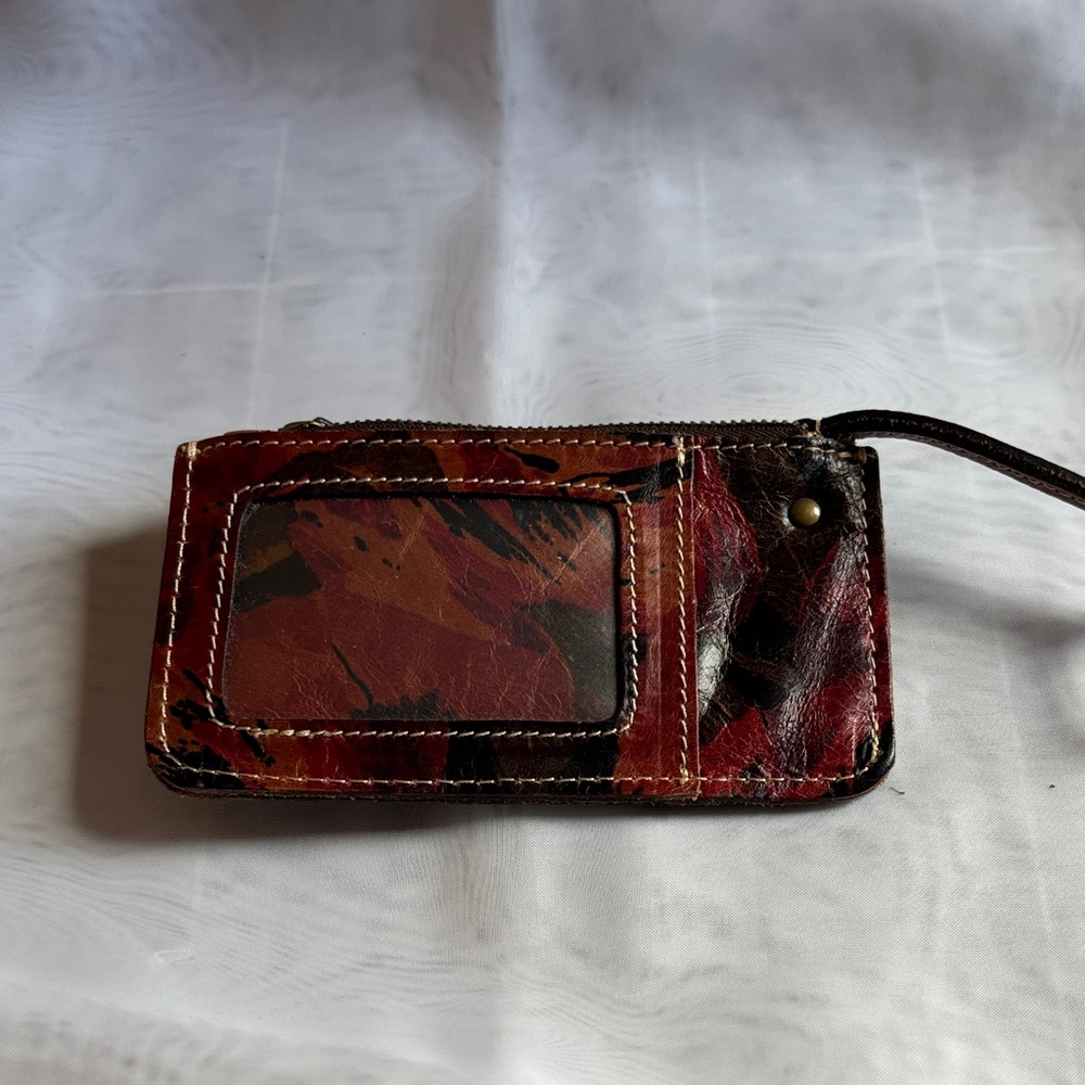 Patrica Nash small purse.  Holds money, change, credit cards and keys.